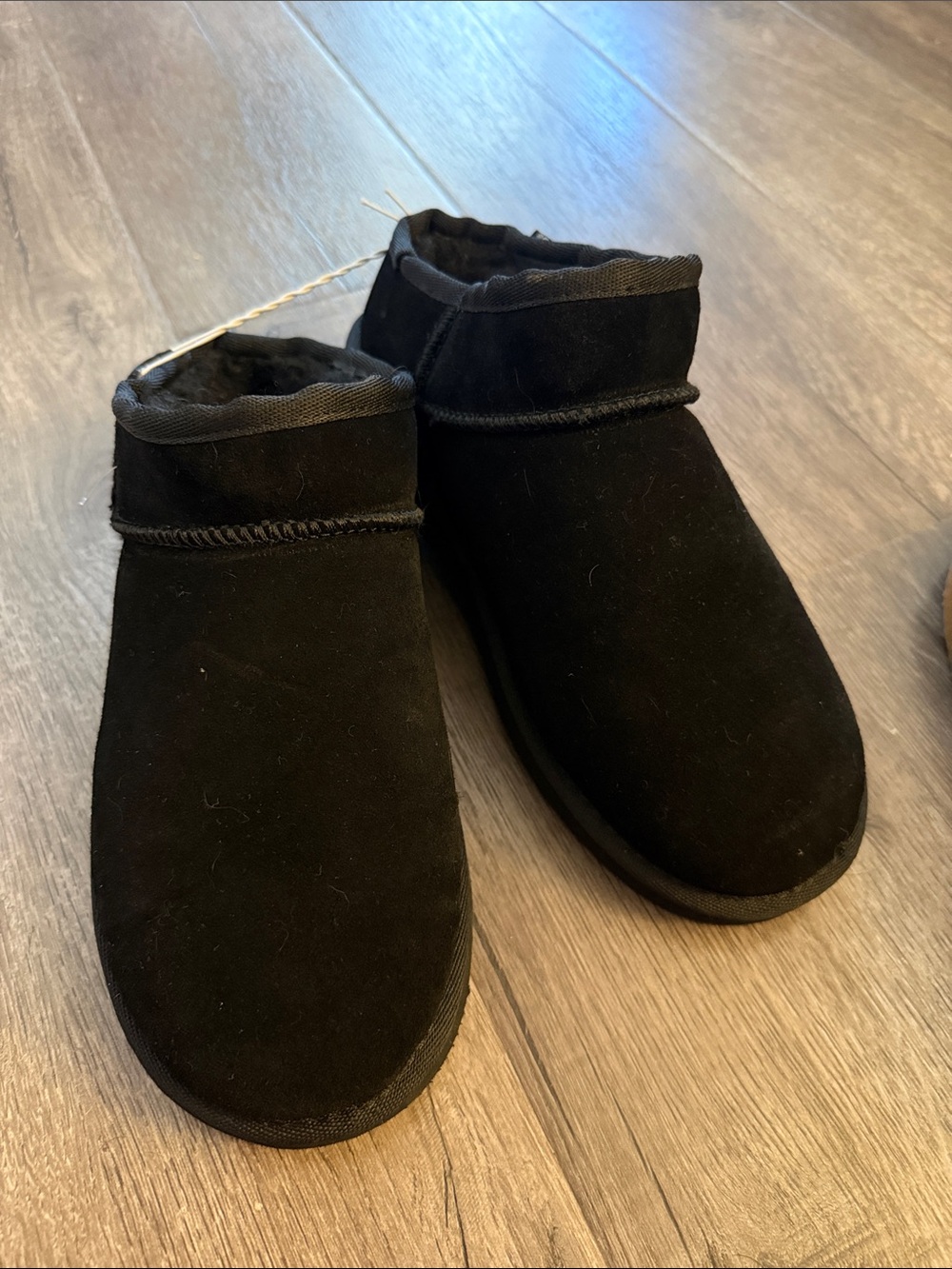 BearPaw womens Black Cozy Slip-On Slippers